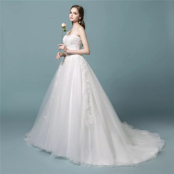 Laura Bridal Couture Simple Elegant Ball Gown